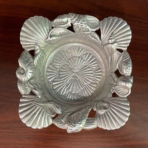 Arthur court wine coaster. Shell pattern